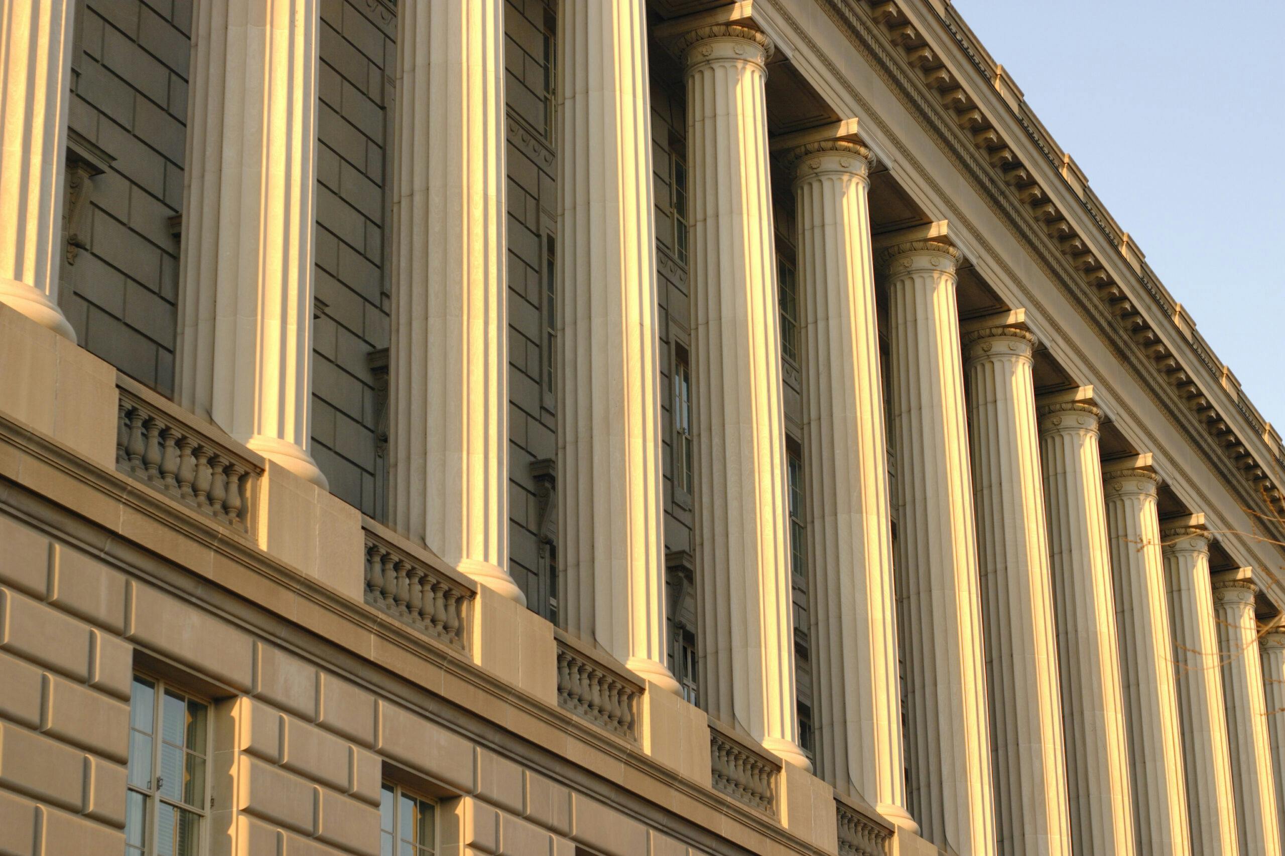 Low angle view of columns on the outside of a building